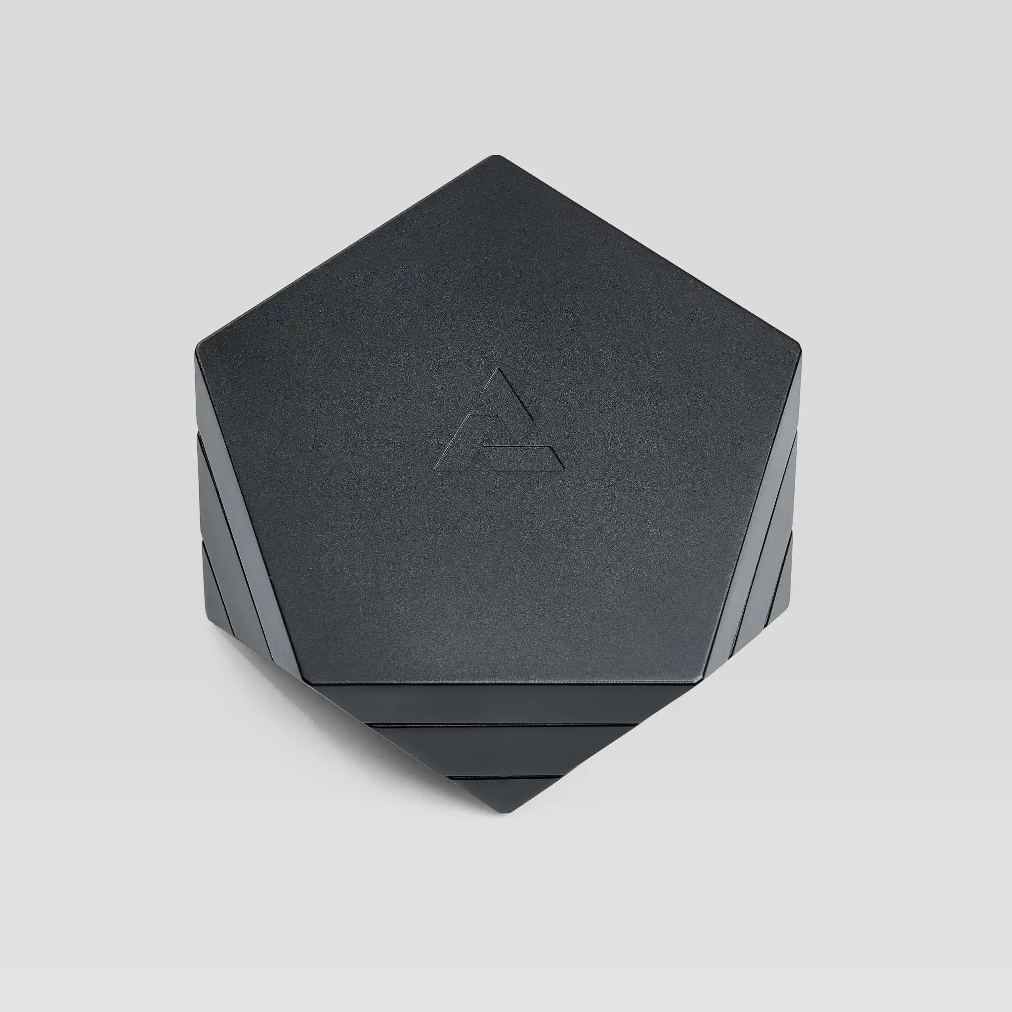 Vesta black magnetic vessel closed, top-down view showing the pentagonal lid
