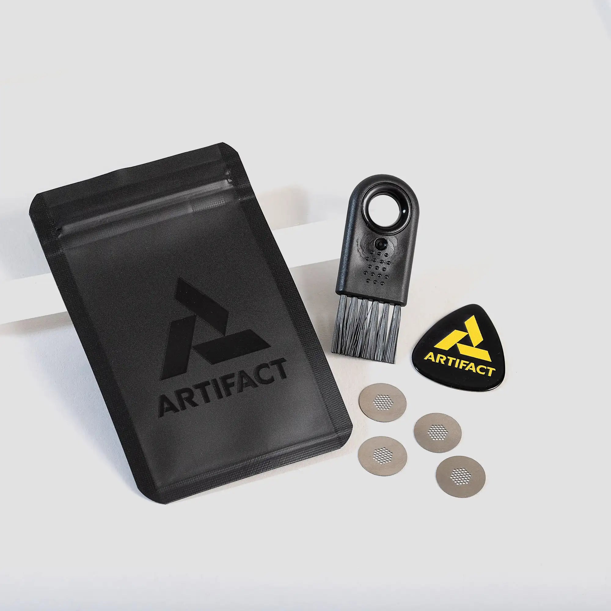 Official Tempest Tools kit featuring branded heavy duty ziplock baggie with Labyrinth cleaning brush, official Artifact branded chamber pick, and four pure-titanium screen filters.