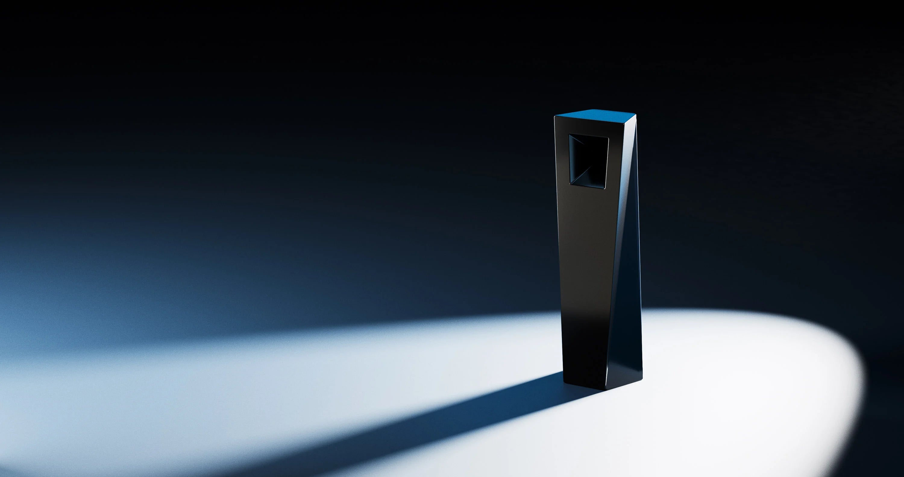 Modern, sleek black Tempest on a reflective surface with a dark background