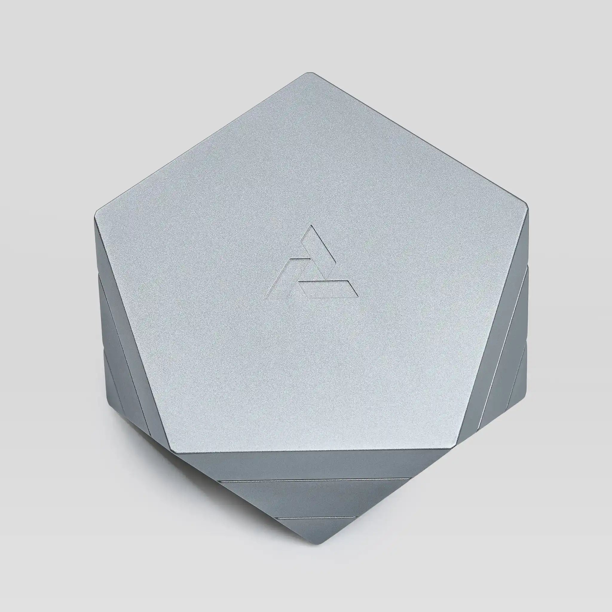 Vesta silver magnetic vessel closed, top-down view showing the pentagonal lid
